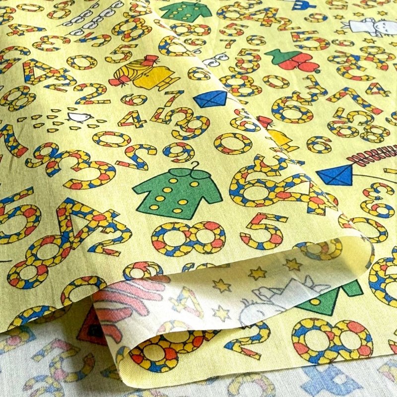 Photo5: Counting🐰Miffy【預訂商品（約 20日到貨）】🟣日本製｜100% 棉 ~ Liberty Tana Lawn 棉布 💡非常輕薄💡柔軟💡透氣💡表面帶有一種類似絲綢咁光滑細緻嘅質感｜⭐米菲計數⭐蠟燭、蘋果、襪子、湯匙和風箏｜2026年 7月 (5)